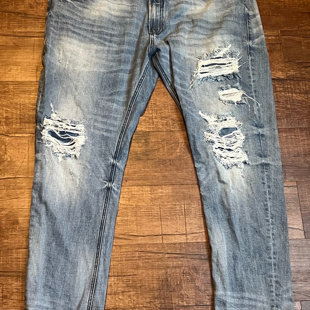 Blue Skinny Jeans with Distressed Details